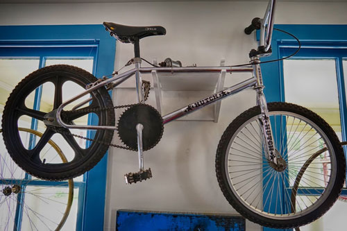 Bike Hanging on Wall So you were heavy into BMX biking and that burns out a little bit?