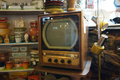 Old Television From The 1950s Set So you have furniture and TV's do people come in here looking for unique items like these? I have never seen stuff like this at a thrift store or antique style stores.